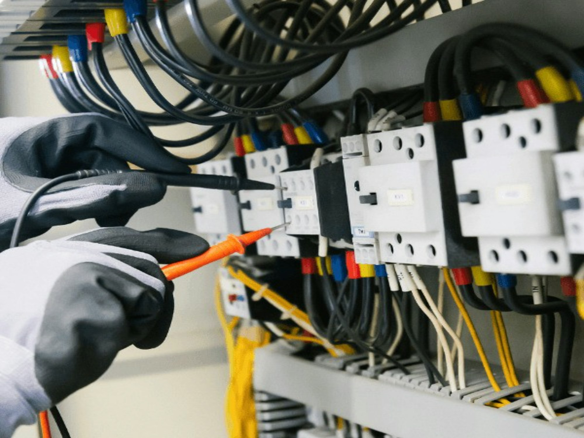 Engineer testing an electrical distribution board